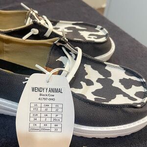 NWT Hey Dude Youth Size 2 Animal Black Cow Print Shoes